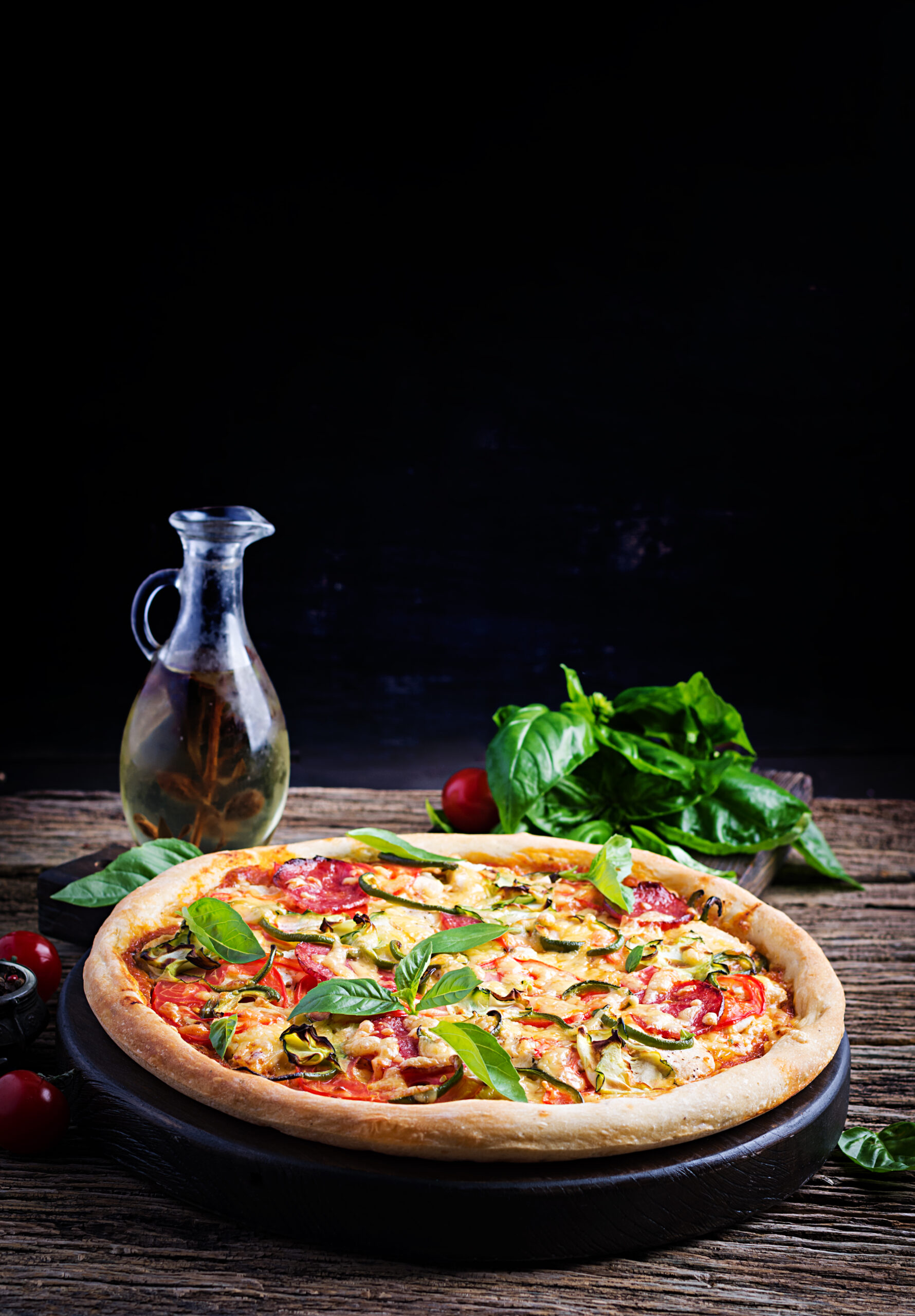 italian-pizza-with-chicken-salami-zucchini-tomatoes-and-herbs